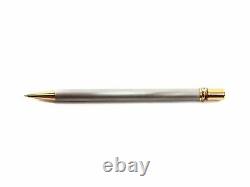 Authentic Cartier gold ribbed silver ball point pen