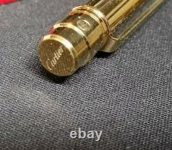 Cartier Ballpoint Pen. Gold plated twist mechanism. Plus Cartier Box
