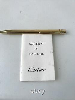 Cartier Ballpoint Pen. Gold plated twist mechanism. Plus Cartier Box