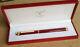 Cartier Ballpoint Pen In Own Cartier Box, Bordeaux Red And Golden, L13.7cm, Used