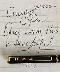 Genuine vintage Omega ballpoint pen (twist to nib) black withgold plate accents