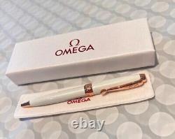 Omega Ladies pen new in box with pen pouch white and rose gold colour