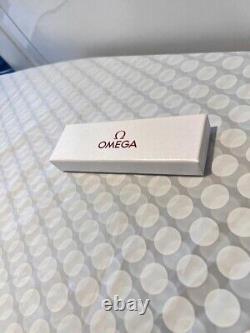 Omega Ladies pen new in box with pen pouch white and rose gold colour