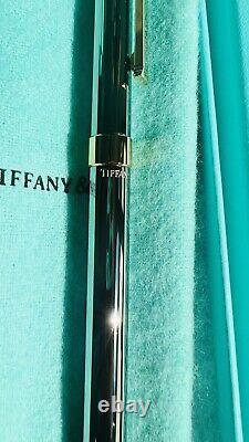 Tiffany & Co. T-clip Pen Sterling Silver with Gold Accent. Authentic